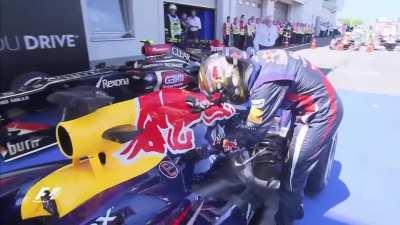 Seb Vettel petting his glorious RB9 at the Nürburgring in 2013