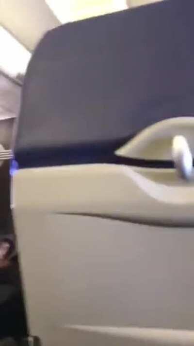 Karen goes homicidal and threatens to kill everyone on the plane