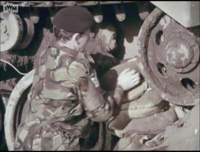 Chieftain crew using an explosive charge to remove a damaged track