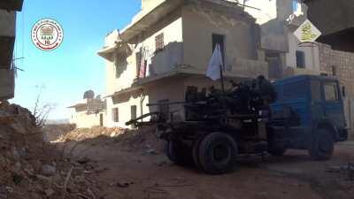 Syrian Rebels replace the bed of a lorry with an AZP S-60 57mm Anti-Aircraft Gun