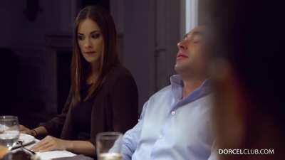 Claire sucks him off under the table right next to Clea