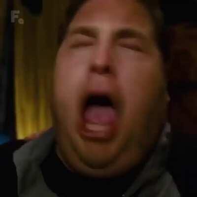 This is called the snorricam shot. . The shot is achieved by rigging a device holding a camera to the body of the actor. As the actor moves, the camera remains stabilized as the background shifts, creating a feeling of dizziness, panic, or paranoia.