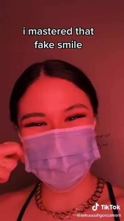 Mastering that fake smile