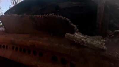 A russian riding an ATV films the moment of impact of a FPV drone.