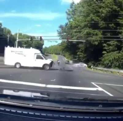 Motorcyclist threads the needle of death
