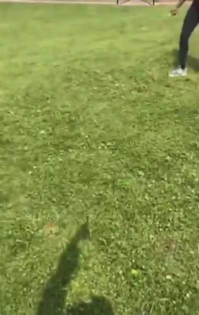 Lady with a gun at a playground