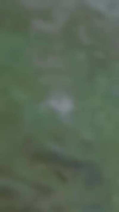 The shades of blue and green of this wave in slow motion