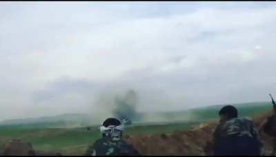 Iraqi PMU members gun down charging ISIS militants whocrasy detonate their suicide vests.