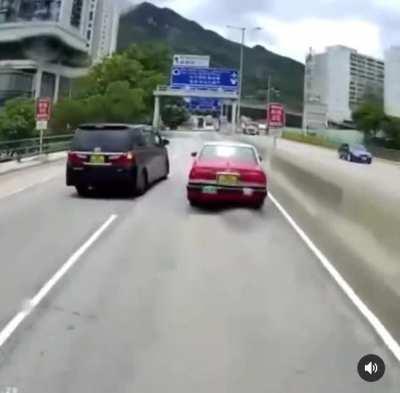 Try to cut off a taxi with a construction vehicle behind you