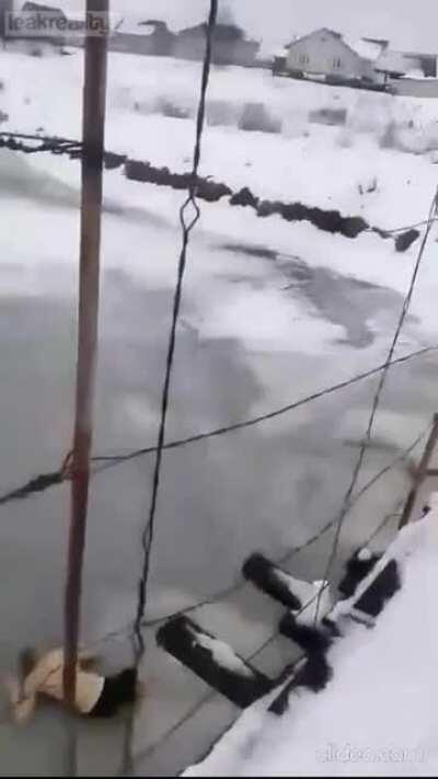 Guy hits ice like Wile E Coyote hits pavement