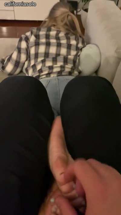Gf surprised with a sneak-tickle attack on her soft soles during movie night