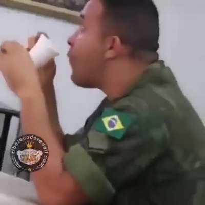 Cursed_Brazilian soldier watching cartoon for children 