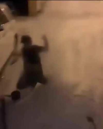 Kid throws boiling water into the air