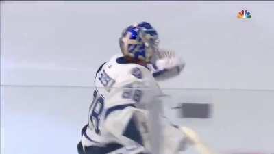 Andrei Vasilevskiy looks for teammates to celebrate with after the win.