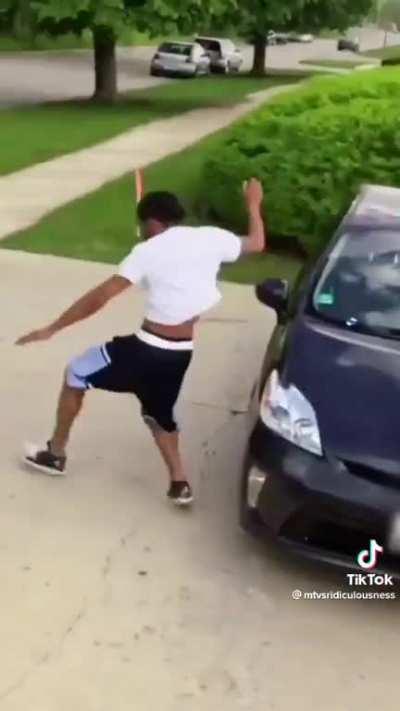 Guy does backflips over cars