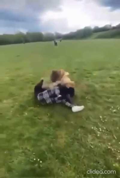 UK girls fight on grass