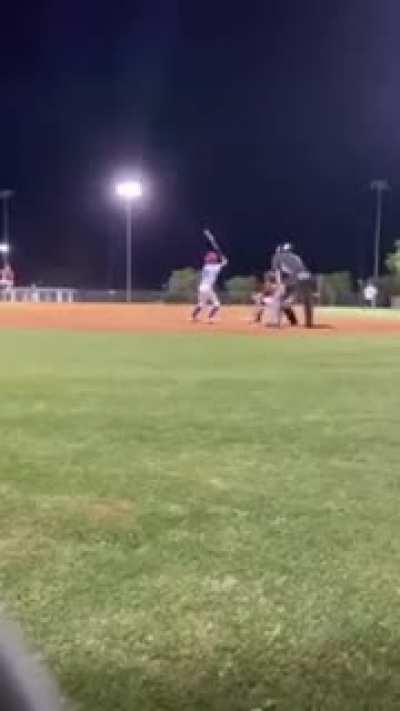 Foul Ball comes in from an adjacent field, batter accidentally hits both balls