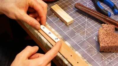 My technique for debossing leather with 3D printed stamps (full video + more details in comments)