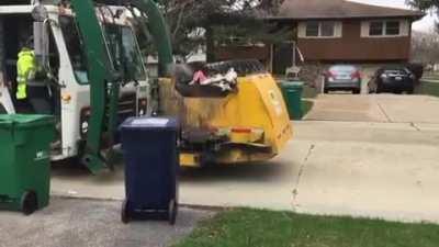 Garbage Truck Bursts Into Flames