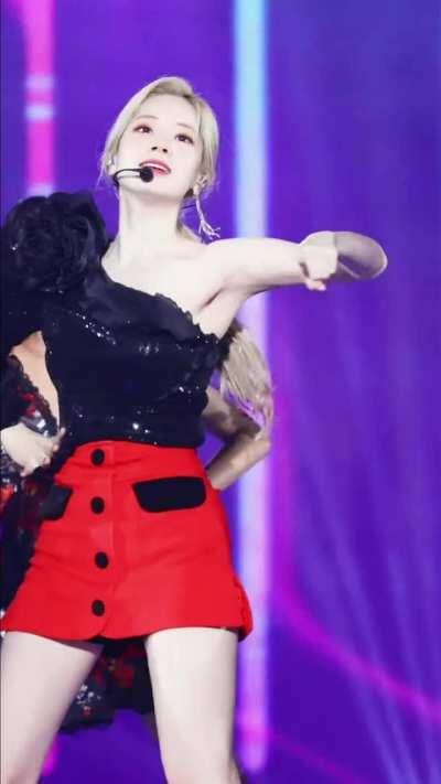 Dahyun - blonde ponytail, red skirt, black top