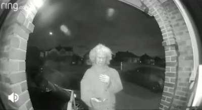 Old lady holding a knife, recorded on a ring cam in the middle of the night...