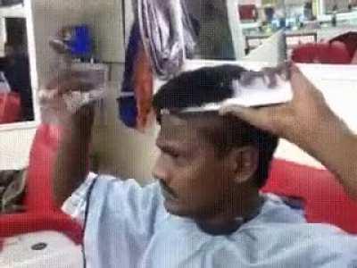 God of Barbers. The Boss who cuts his own hair before the fight.