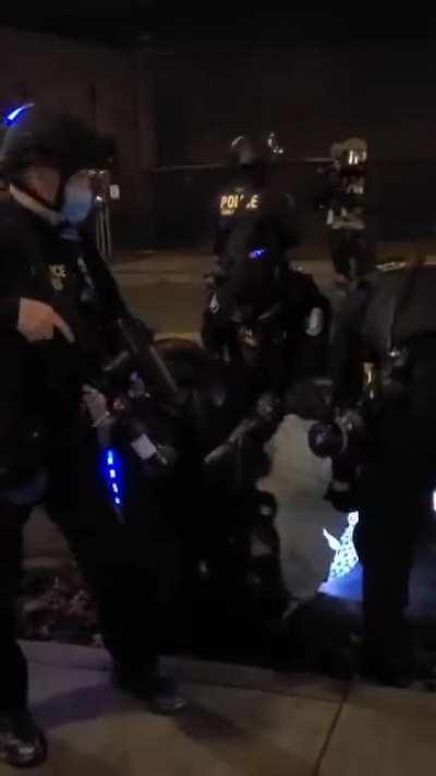 Chased and tackled a protester for standing on the sidewalk in front of the ICE driveway. 1/21