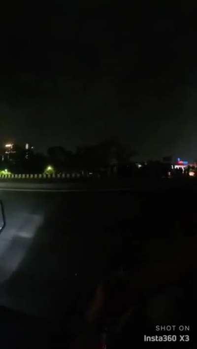 Standing in the middle of a highway 