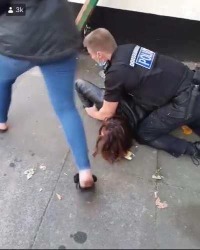 To help her friend avoid arrest. (Norwich, UK)