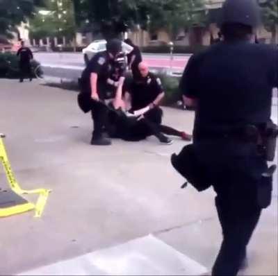 From this view you can see the cop grope the woman he's restraining, that's why she breaks away .Then of course a half dozen cops beat her for not wanting to be groped , This is a fraction of what is happening atm, Don’t let this go unseen