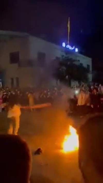 Iranian women burn their hijabs to protest the murder of a Iranian girl by tge hands of morality police