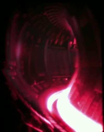 Here is a video of an actual fusion reaction in a fusion reactor. What you see is a plasma with a temperature of 100 million degrees Celsius, ten times the temperature of the Sun's core