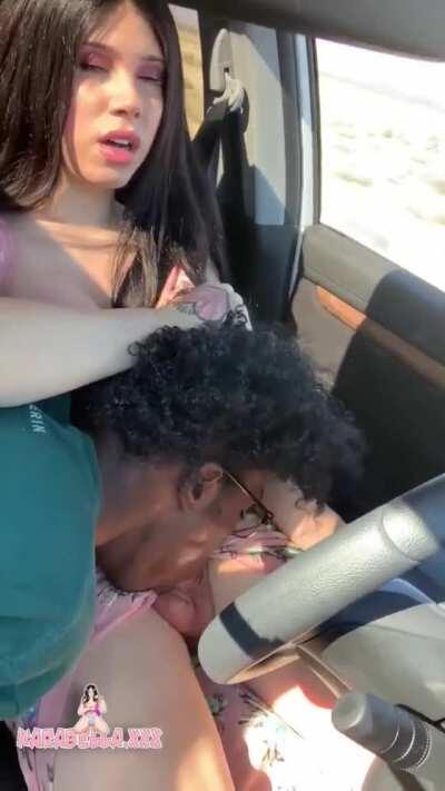 Karabella gets a blowjob while driving her car (gif)