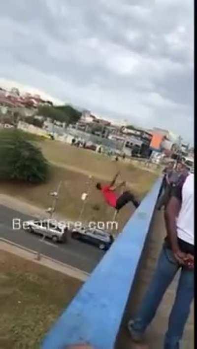 Trying to backflip off a bridge.