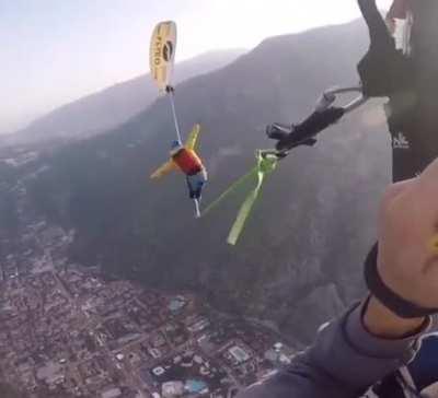 it is difficult to say whether he managed to open the parachute or not