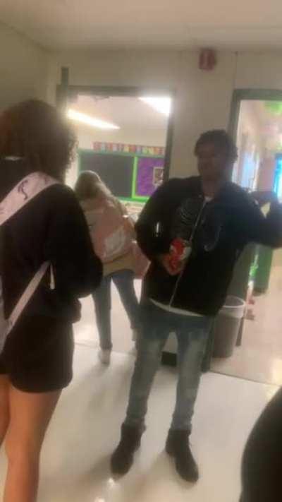 Girl shoves boy at school and he reacts...