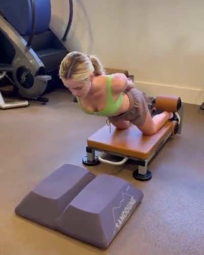 Kiernan Shipka in a gym