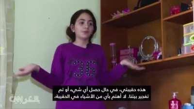 A Palestinian kid in Gaza freaks out and cries after hearing the sounds of Israeli bombing nearby. His brave older sister tries to calm him down.