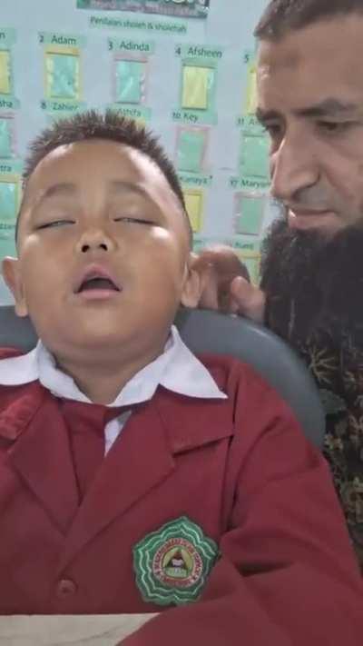 Trying to take a nap in class. 