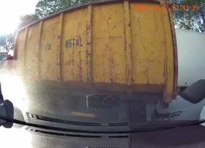 this idiot getting real up close to the truck's ass..