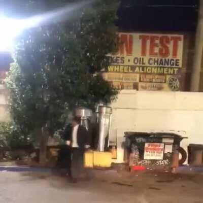 Business owner takes out trash, only to discover a couple of lovers making night moves behind the dumpster.