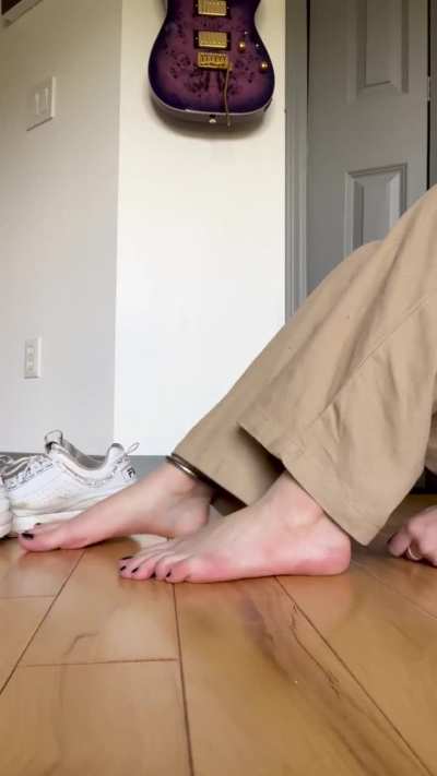 Taking My Shoes Off After A Long Walk