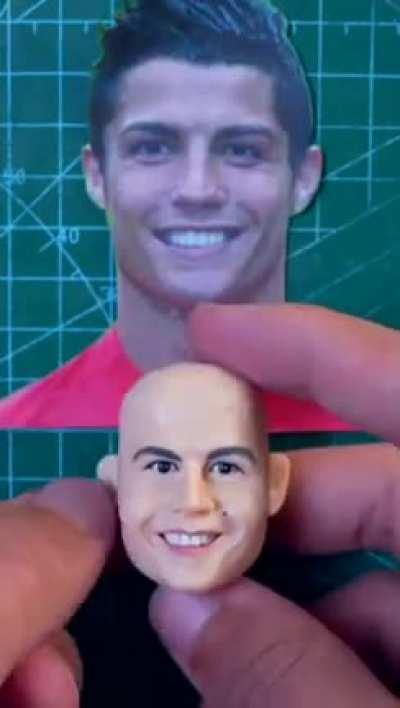 Made a Cristiano Ronaldo sculpture with polymer clay .