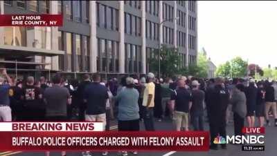 Buffalo police applaud 2 officers accused of assaulting 75 year old as they are released on bail