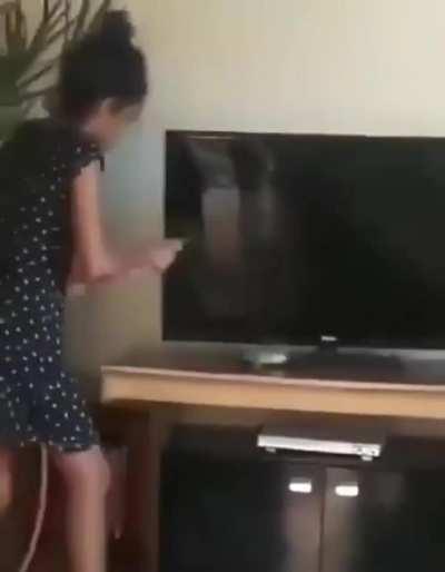 I'm just cleaning the tv like you asked me ma