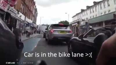 This car is in the bike lane:(