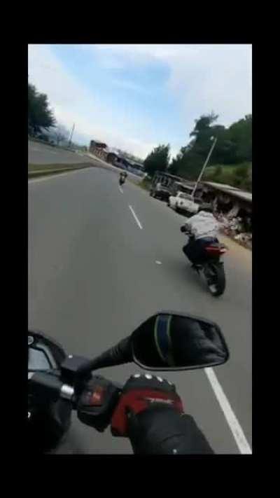 guy racing on a 200cc bike