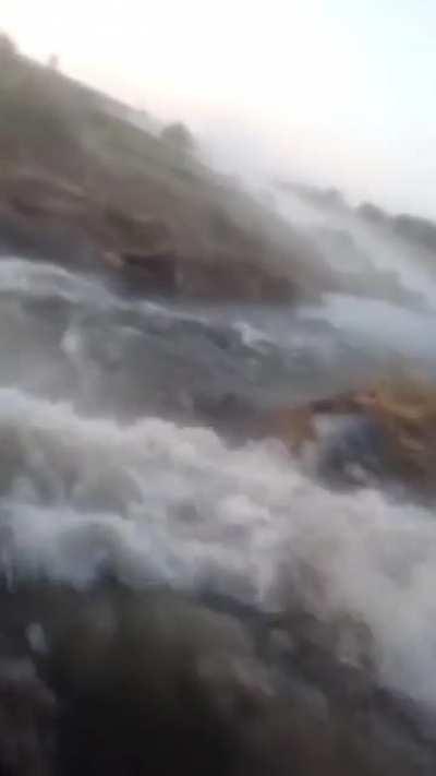 Ua pov Ukrainian troops and their equipment cross river in a PTS-2 amphibious carrier