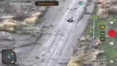 RU POV: Ukrainian drone attacks Russian delivery robot