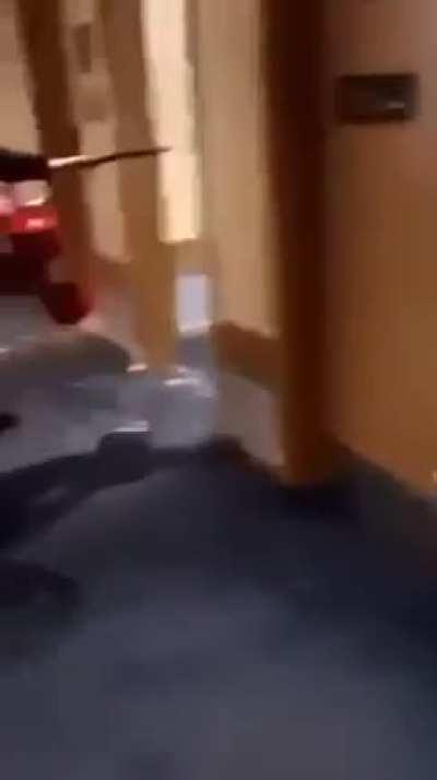 How to handle a streaker in the hotel room next door